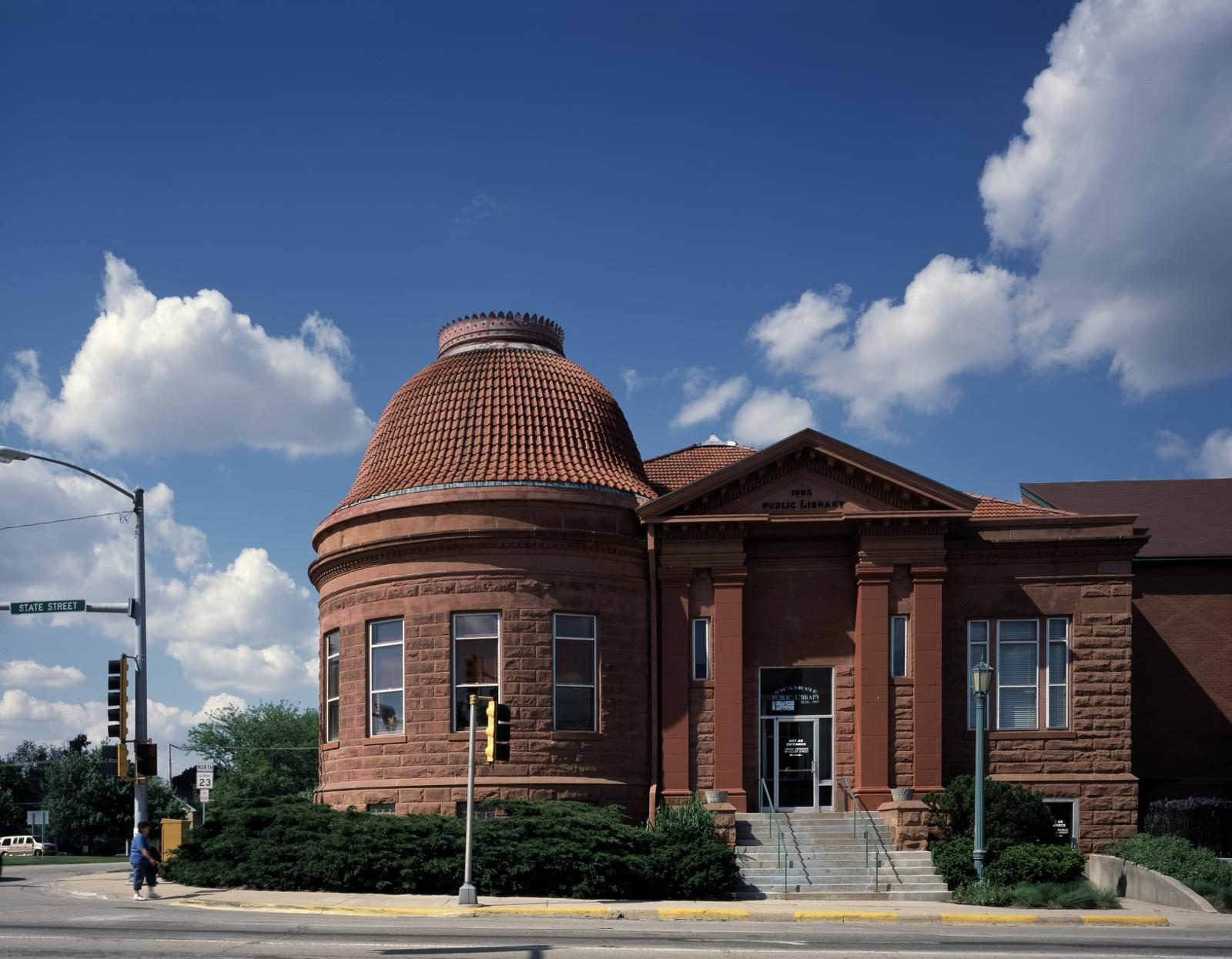 The historic stone Brightwater Public Library with its rounded tower